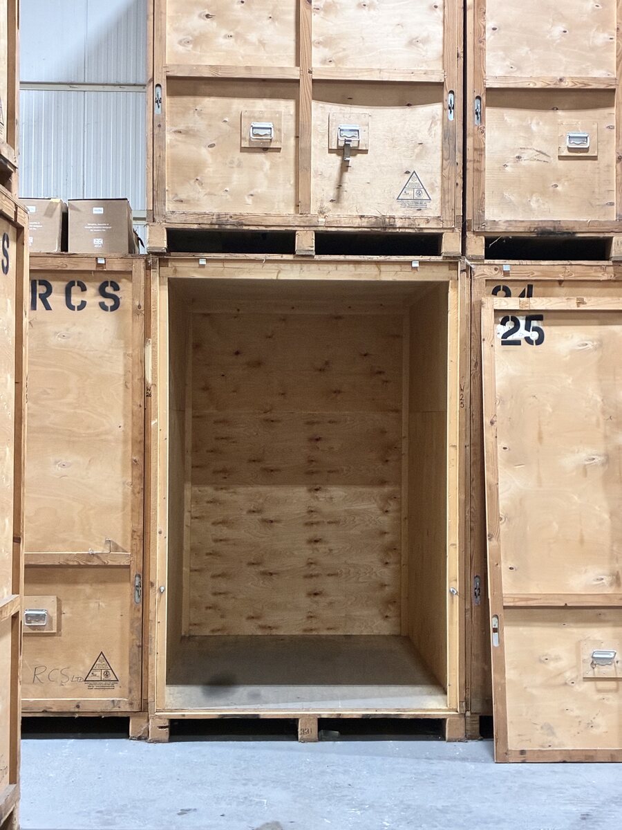 Open wooden storage unit inside the RCS warehouse