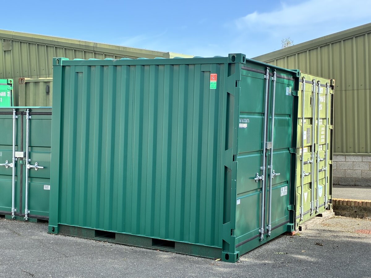 Green and white outdoor storage units at RCS