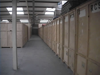 Corridor of individual insulated lock-up storage units inside a warehouse